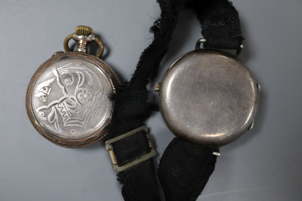 A silver and enamel wrist watch, a silver napkin ring, silver pill box and five assorted worn coins.